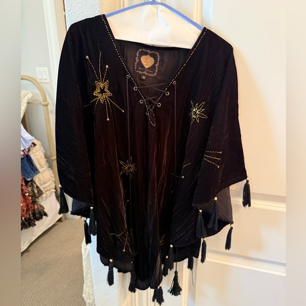 Elegant Black Tunic with Gold Star Detailing